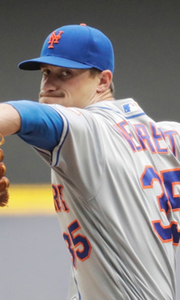 Walker leaves with back injury in Mets' loss to Brewers
